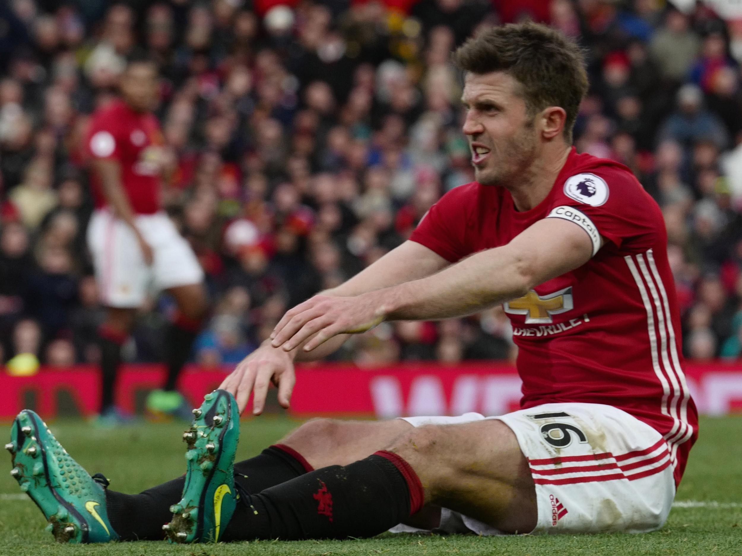 Michael Carrick suffered cramp towards the end of the draw with Arsenal