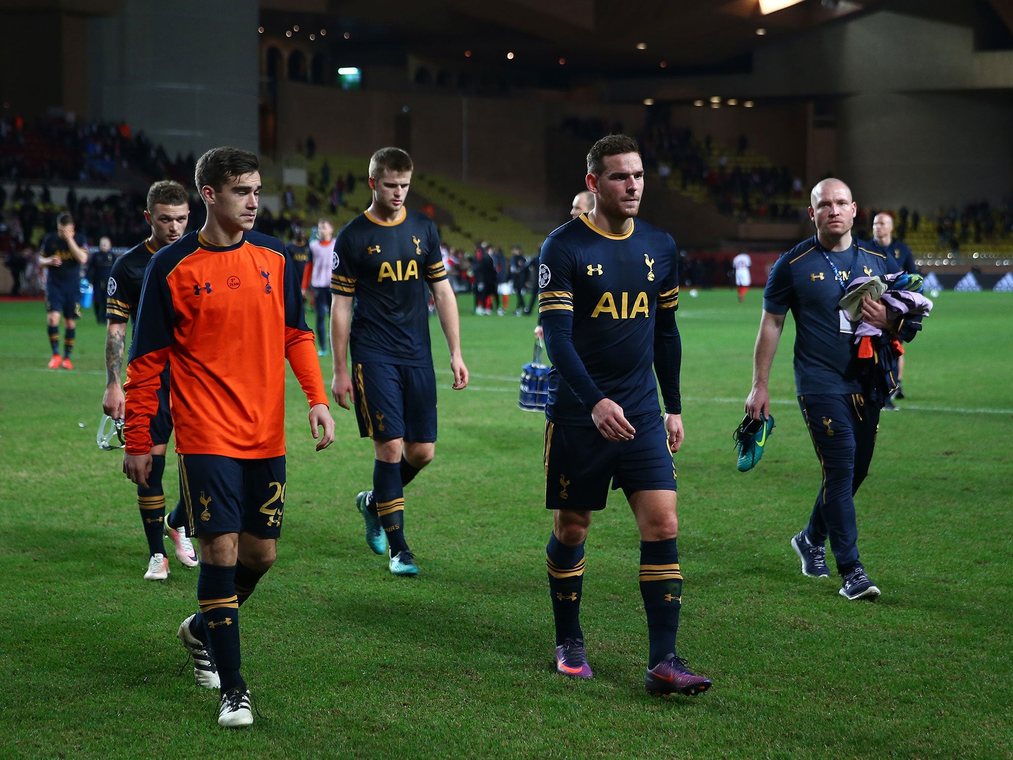 Tottenham's dejected players leave the pitch after being dumped out of the Champions League with a game to spare