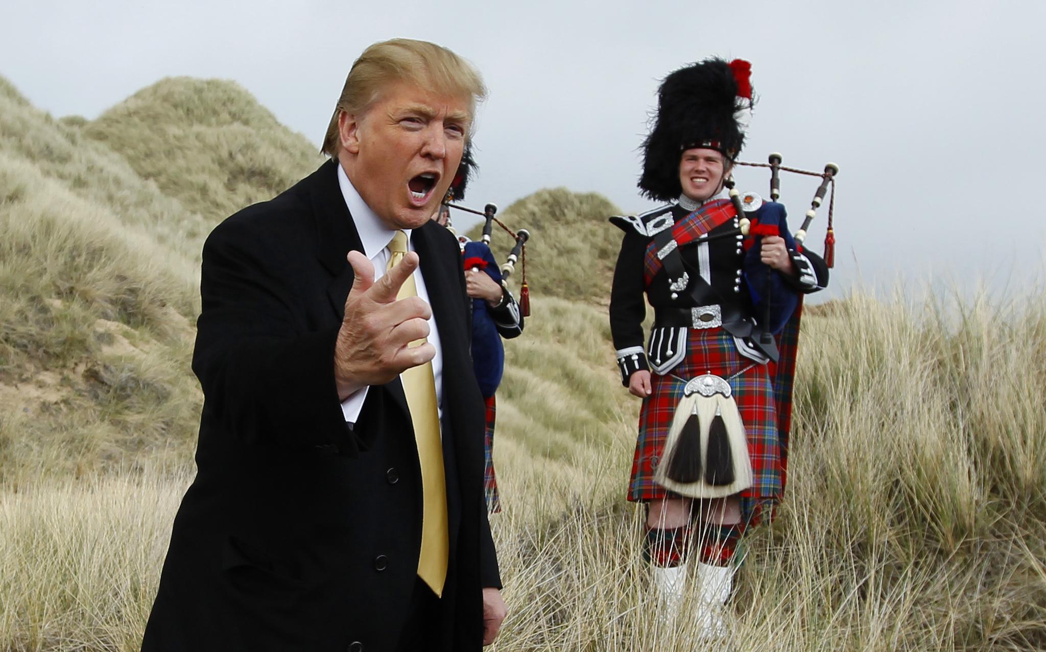 &#13;
Donald Trump gestures during a media event at the golf course site in May 2010, shortly after telling the assembled press that one of Mr Milne’s neighbours lived in “a pigsty” &#13;