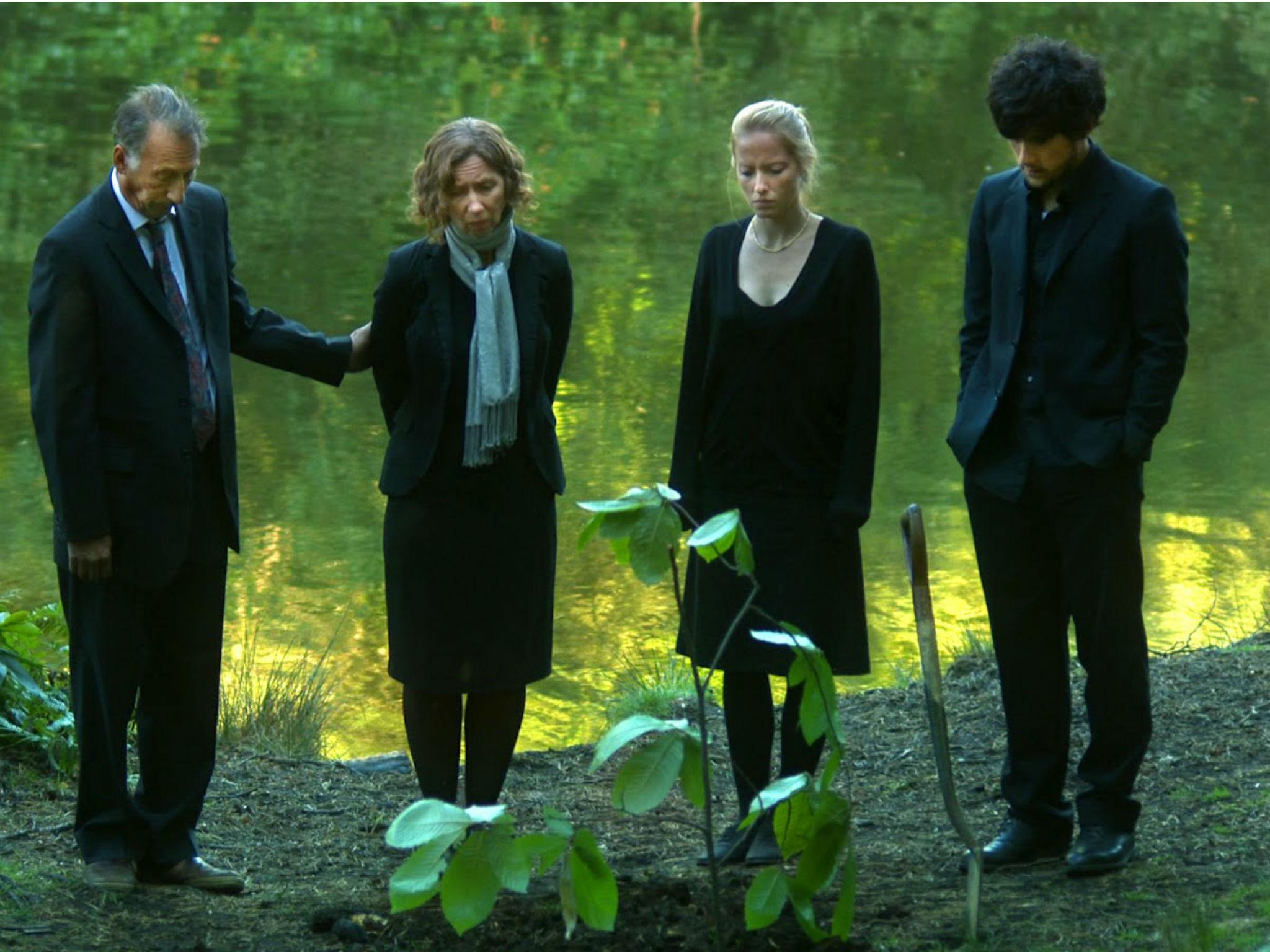 The family at the pond in Black Pond (2011) starring Chris Langham (left) in a debut film by Tom Kingsley and Will Sharpe