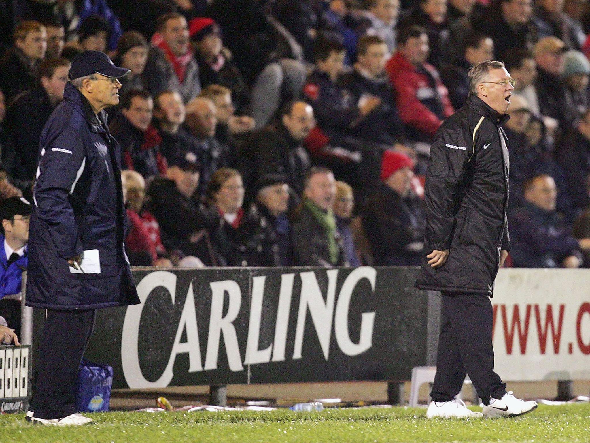 Gradi as manager of Crewe pictured alongside former Manchester United boss Sir Alex Ferguson during a Carling Cup match between the two sides in October 2006