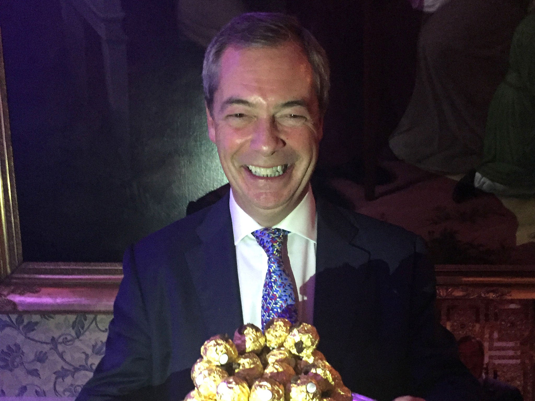 Nigel Farage is presented with a tray of Ferrero Rocher chocolates at an event to thank him for his contribution to Brexit, at The Ritz, London.