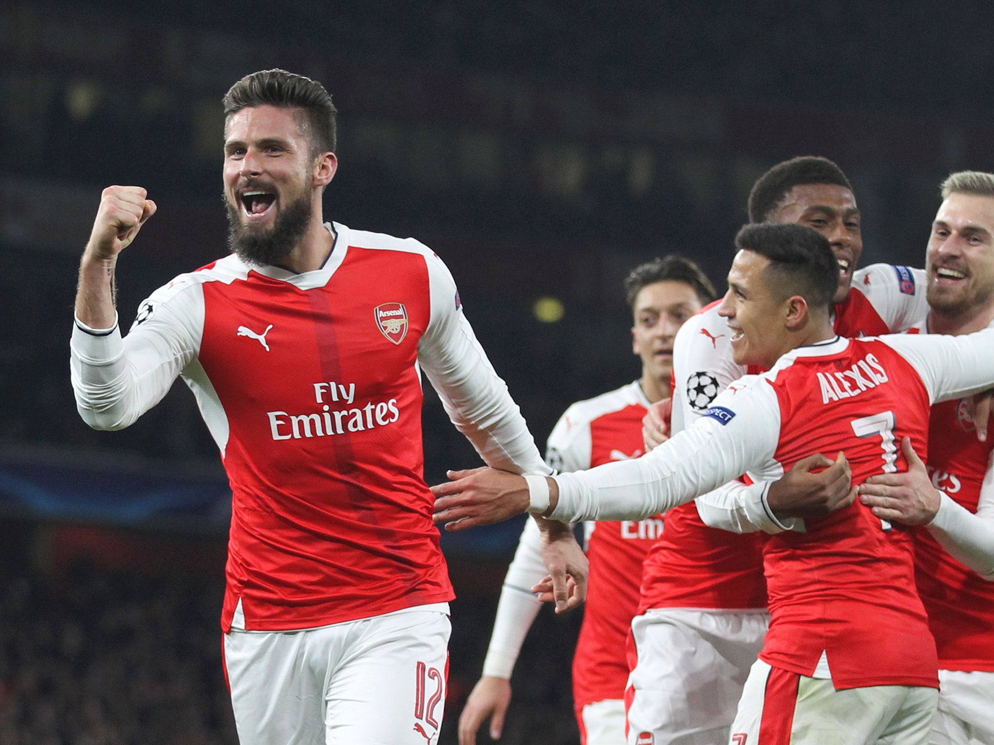 Giroud celebrates equalising from the penalty spot