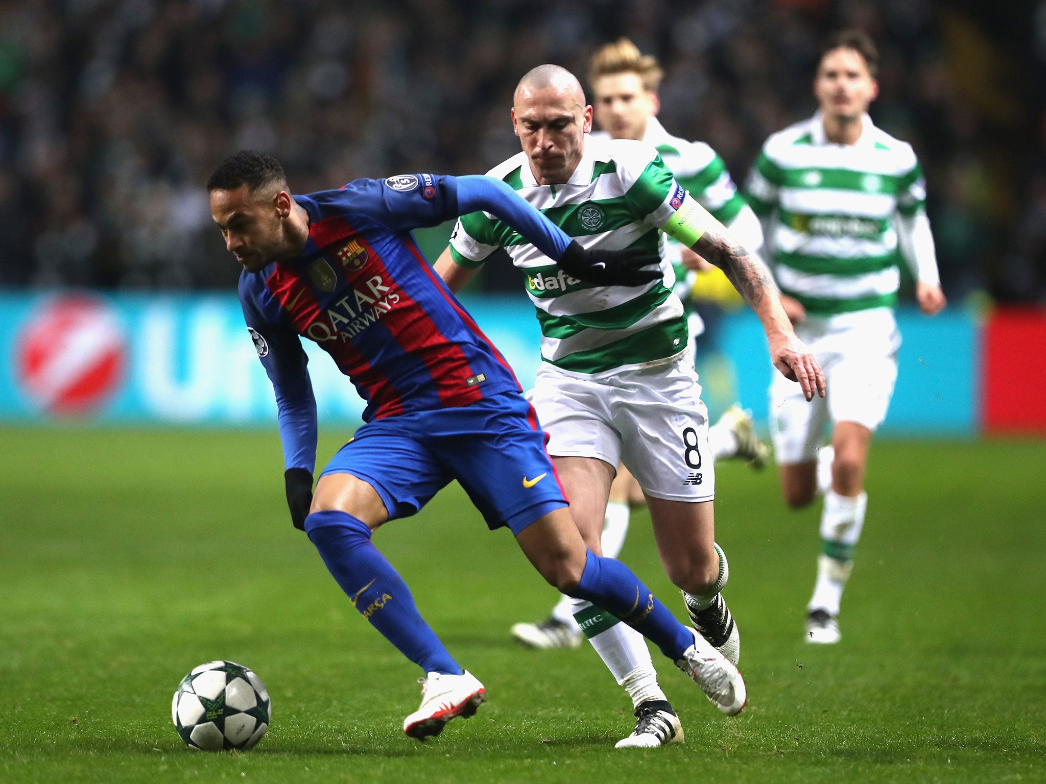 Neymar bids to get away from Celtic's Brown