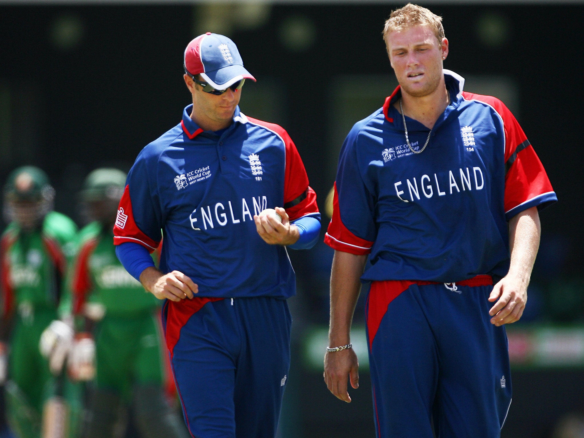 Andrew Flintoff (R) with England captain Michael Vaughan during their World Cup game against Kenya at Beausejour Cricket Ground in Gros Islet, 24 March 2007