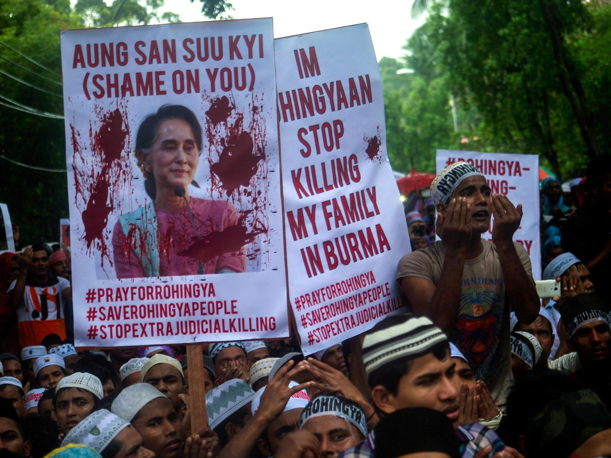 Rohingya Muslims demonstrate outside the Burmese embassy in Kuala Lumpur