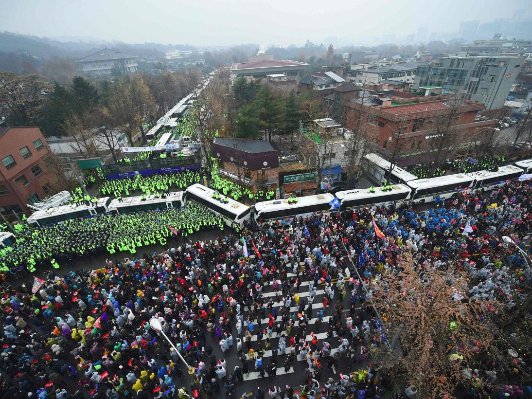 Protesters take to the streets to press their demand for the resignation of South Korea's President Park Geun-Hye in central Seoul