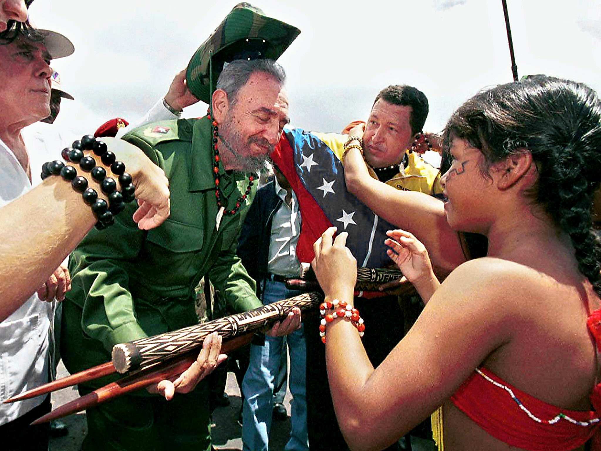 The president of Cuba, Fidel Castro, receives gifts during a visit to the Canaima National Park in the state of Bolivar, Venezuela