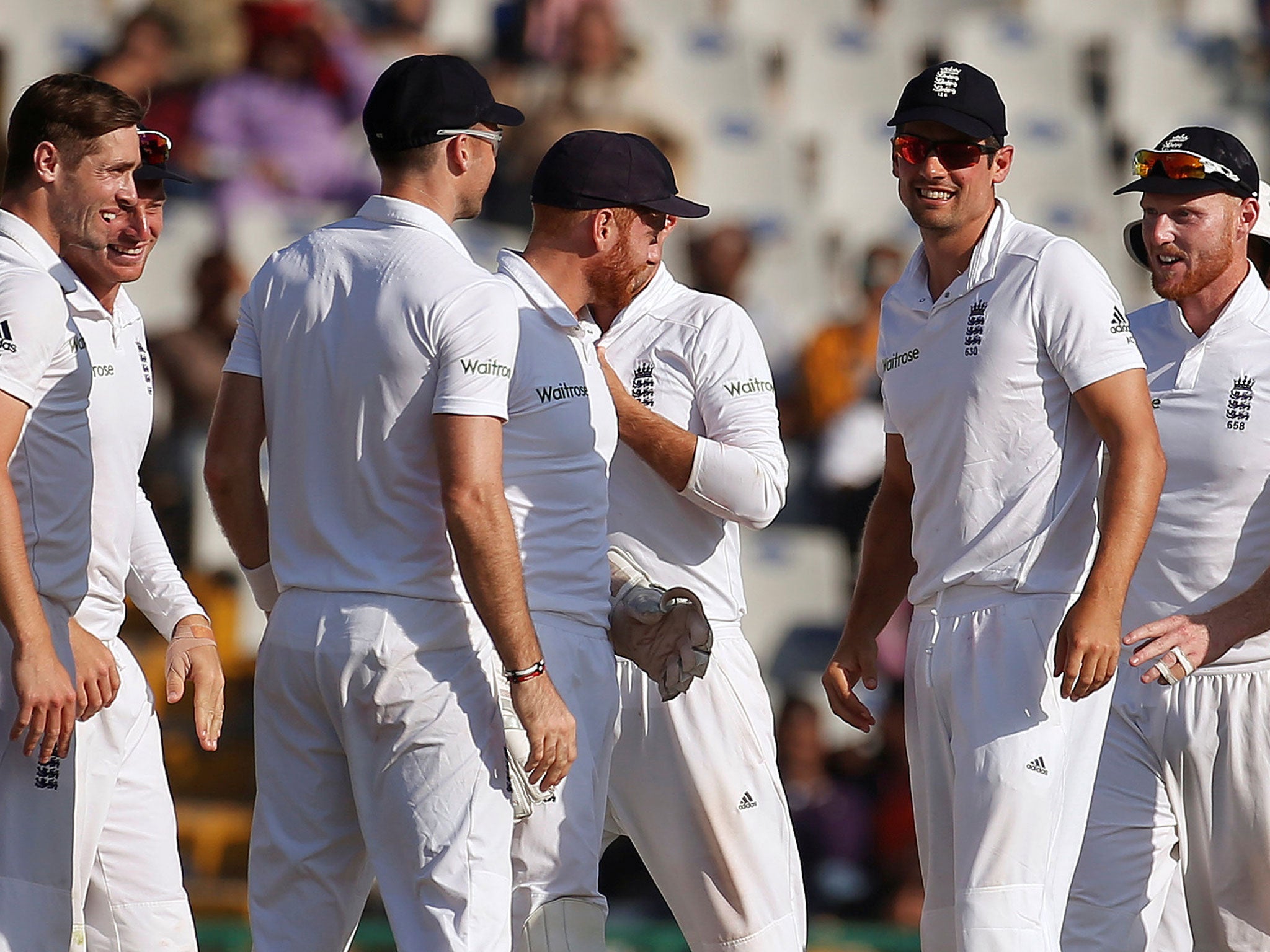 England's Alastair Cook (2nd R) celebrates the dismissal of India's Karun Nair with his team mates