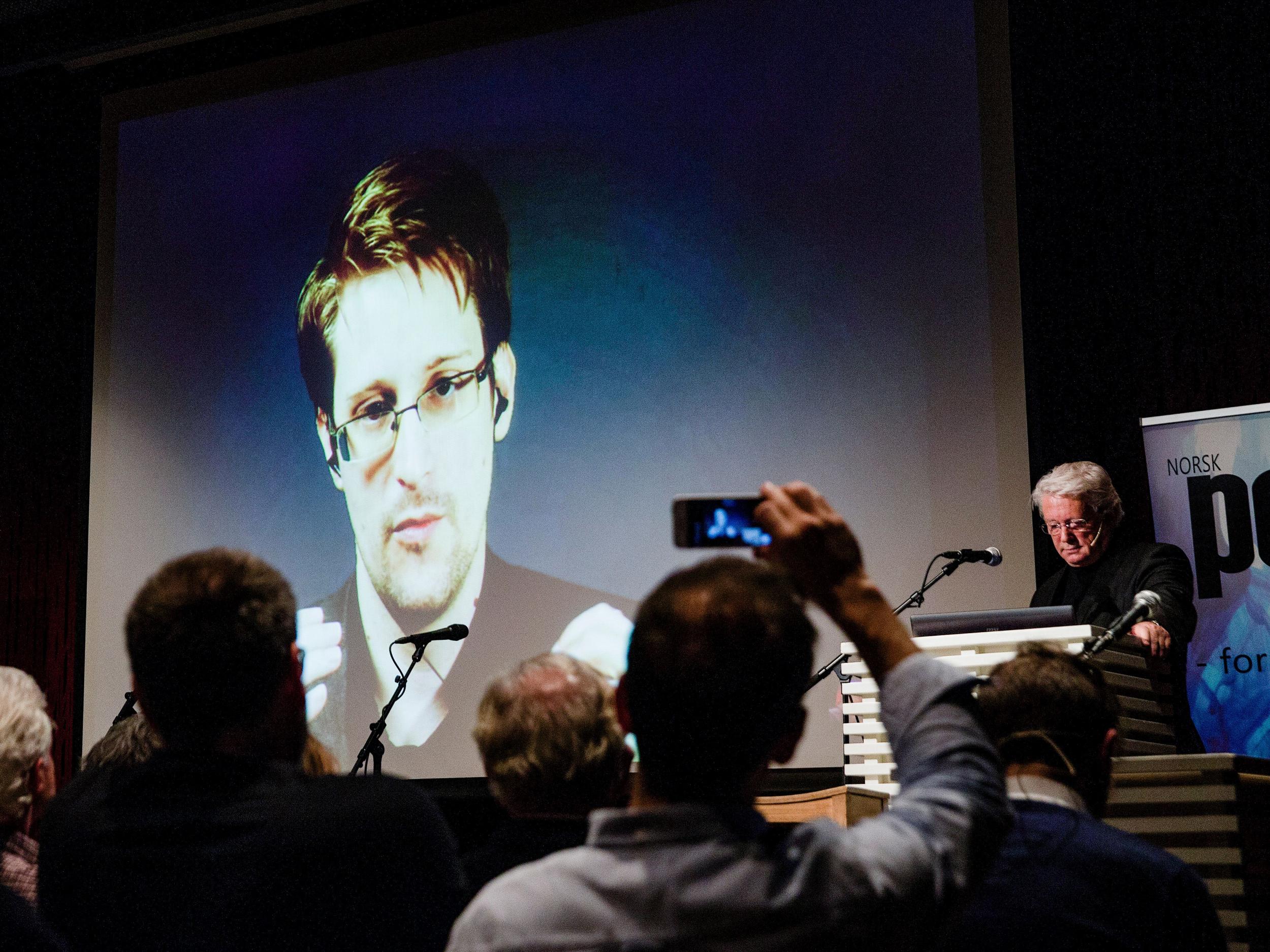 &#13;
Snowden seen live from Moscow at the Norwegian PEN event ‘Waiting for Snowden’ in Oslo in November 2016 (AFP/Getty)&#13;