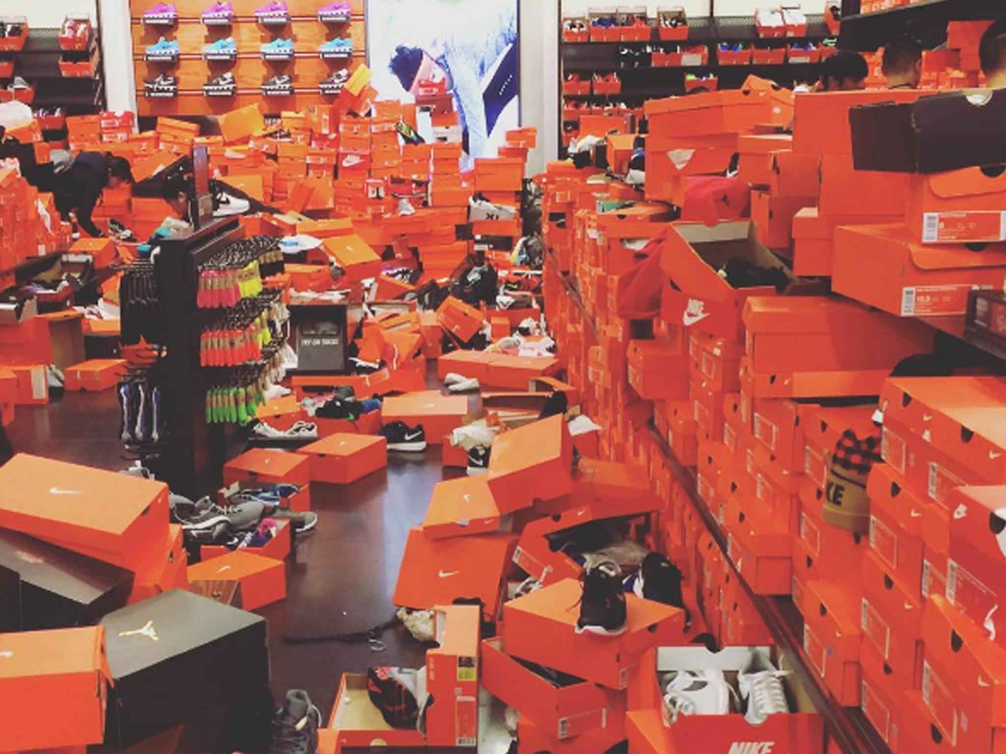 One customer described people "swimming through" orange boxes in search of deals