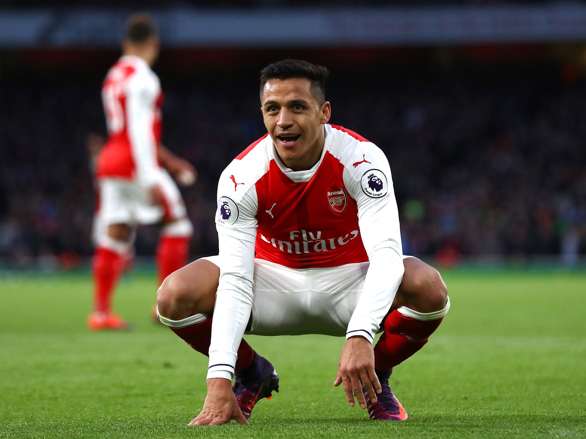 Sanchez scored twice as Arsenal were made to earn three points by Bournemouth