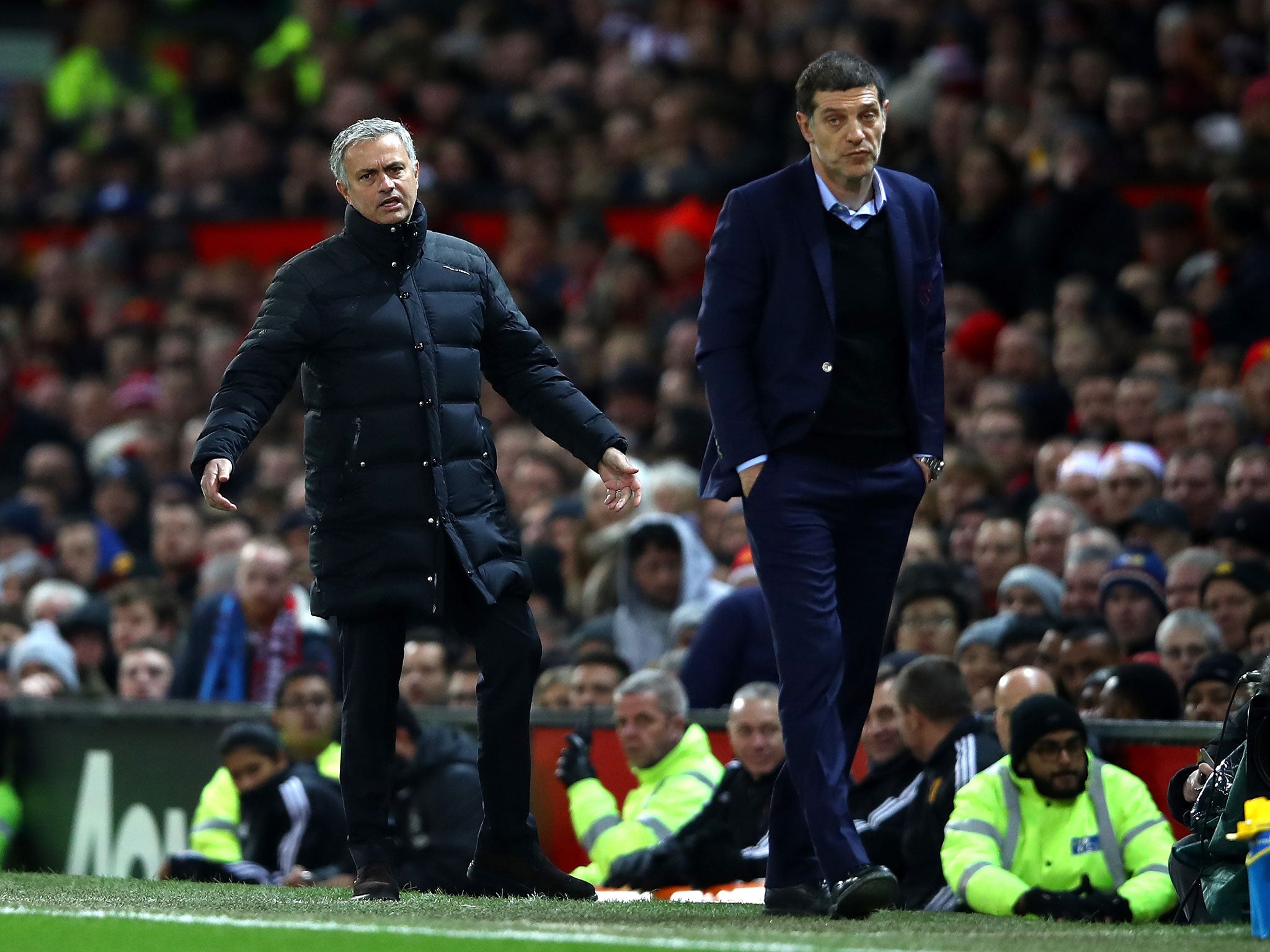 Jose Mourinho and Slaven Bilic watch on from the sideline