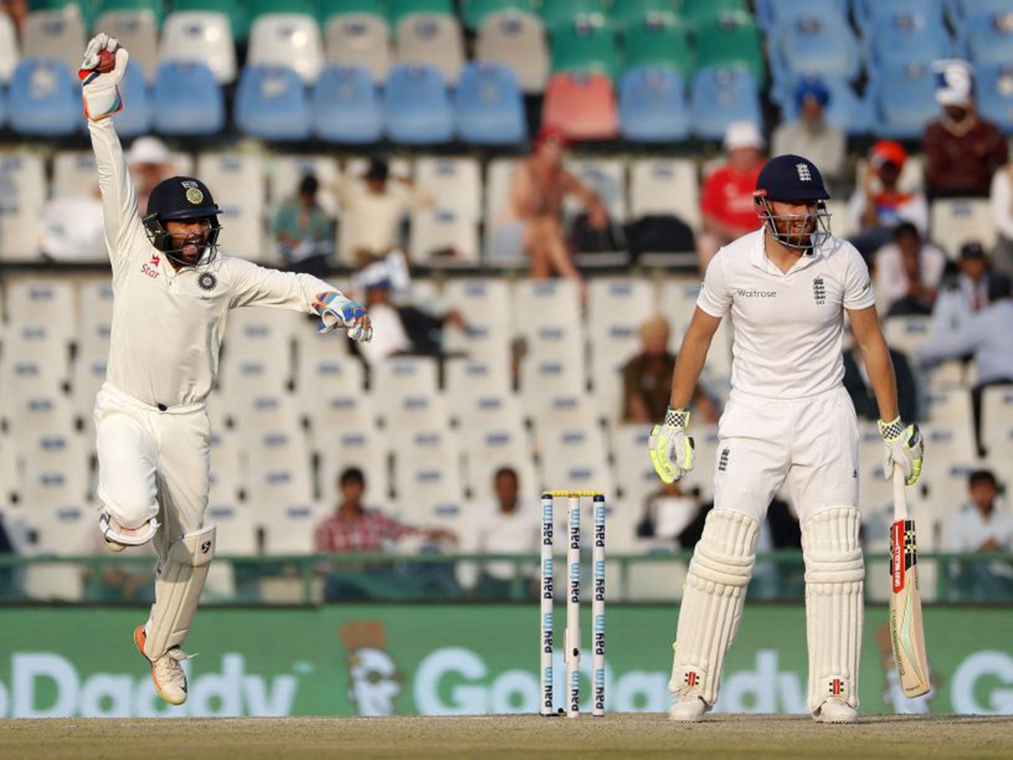 Jonny Bairstow is given out as India wicketkeeper Parthiv Patel celebrates