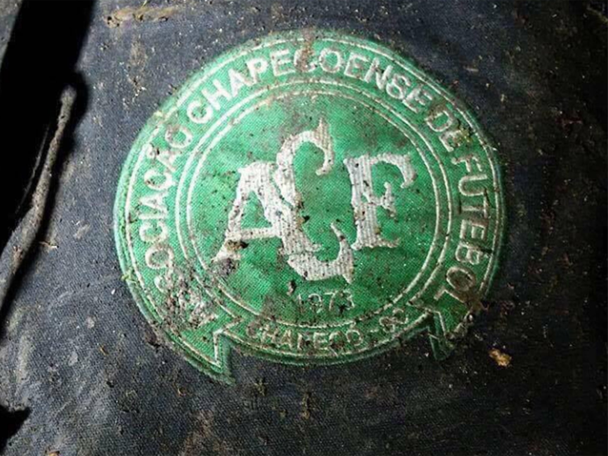 Image of a Chapecoense badge purportedly found at the crash site, shared by Colombian media