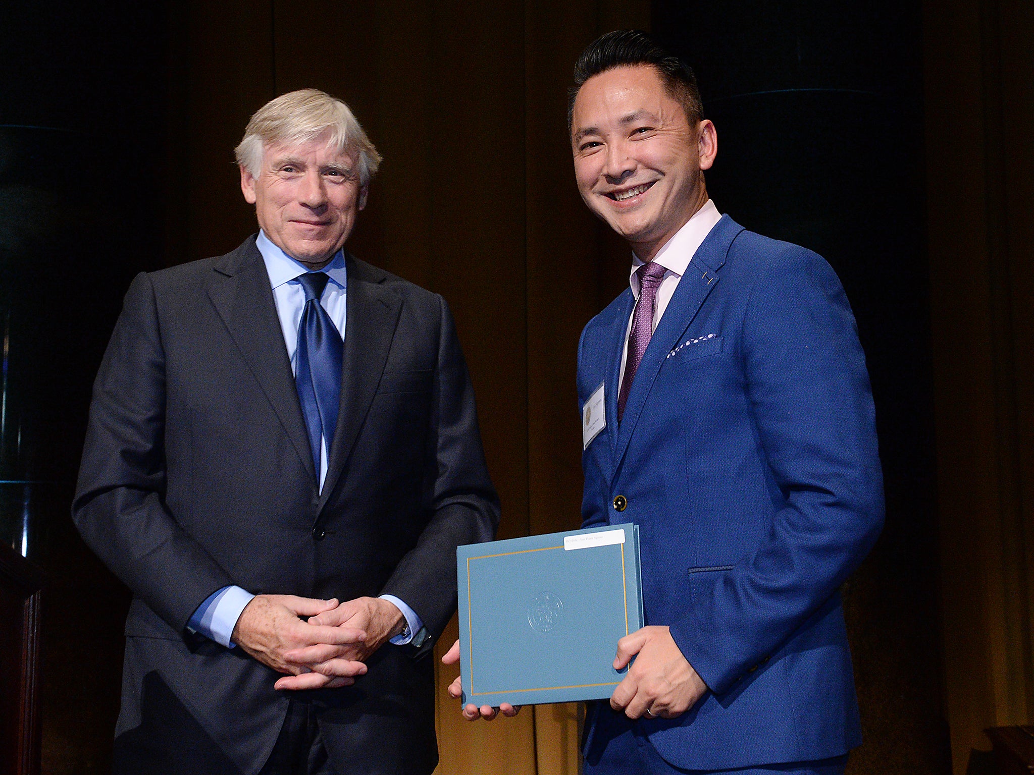 Nguyen receives the 2016 Fiction Prize from Columbia University President Lee C Bollinger