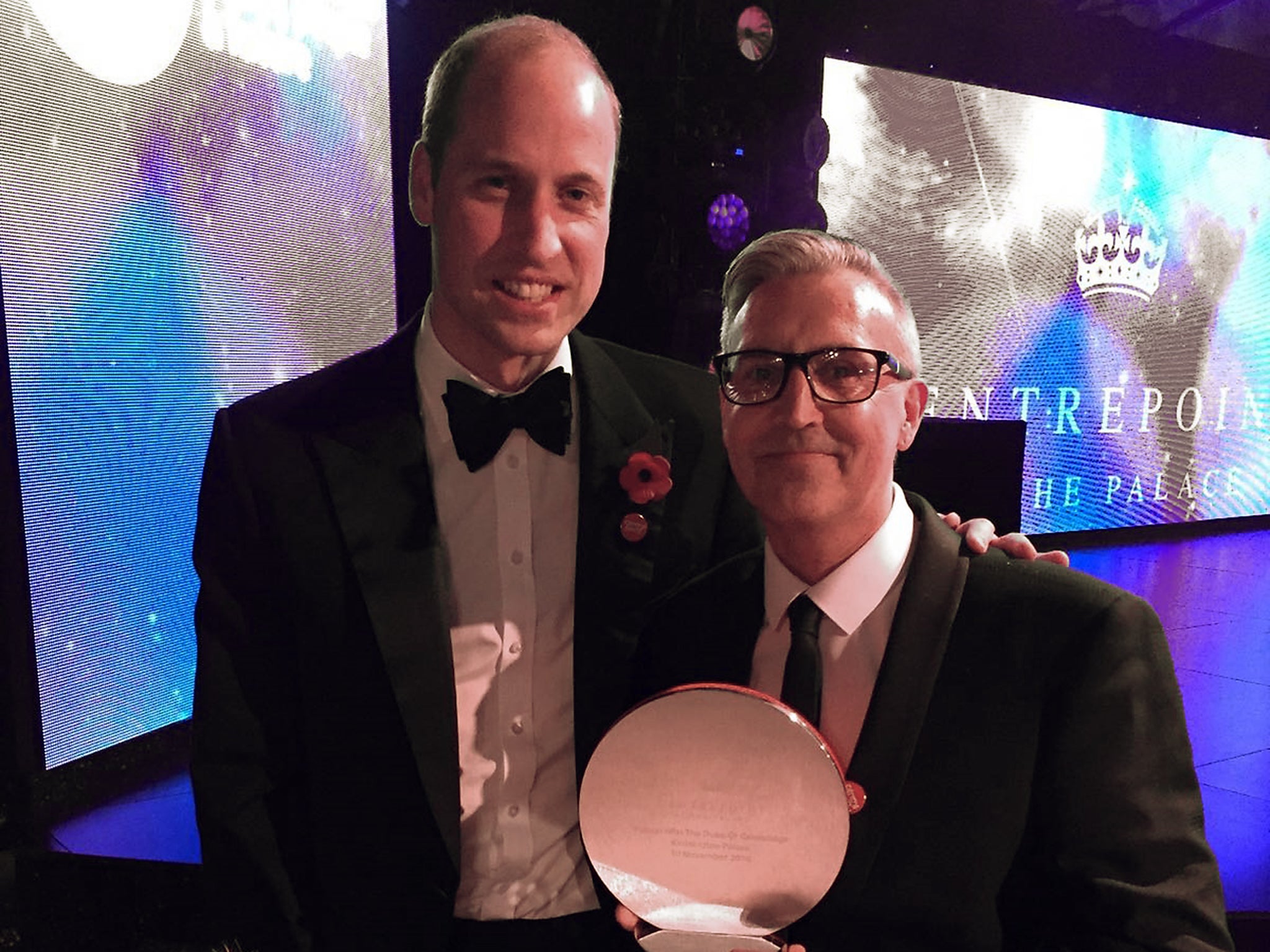 Matt Carlisle receiving his award from the Duke of Cambridge