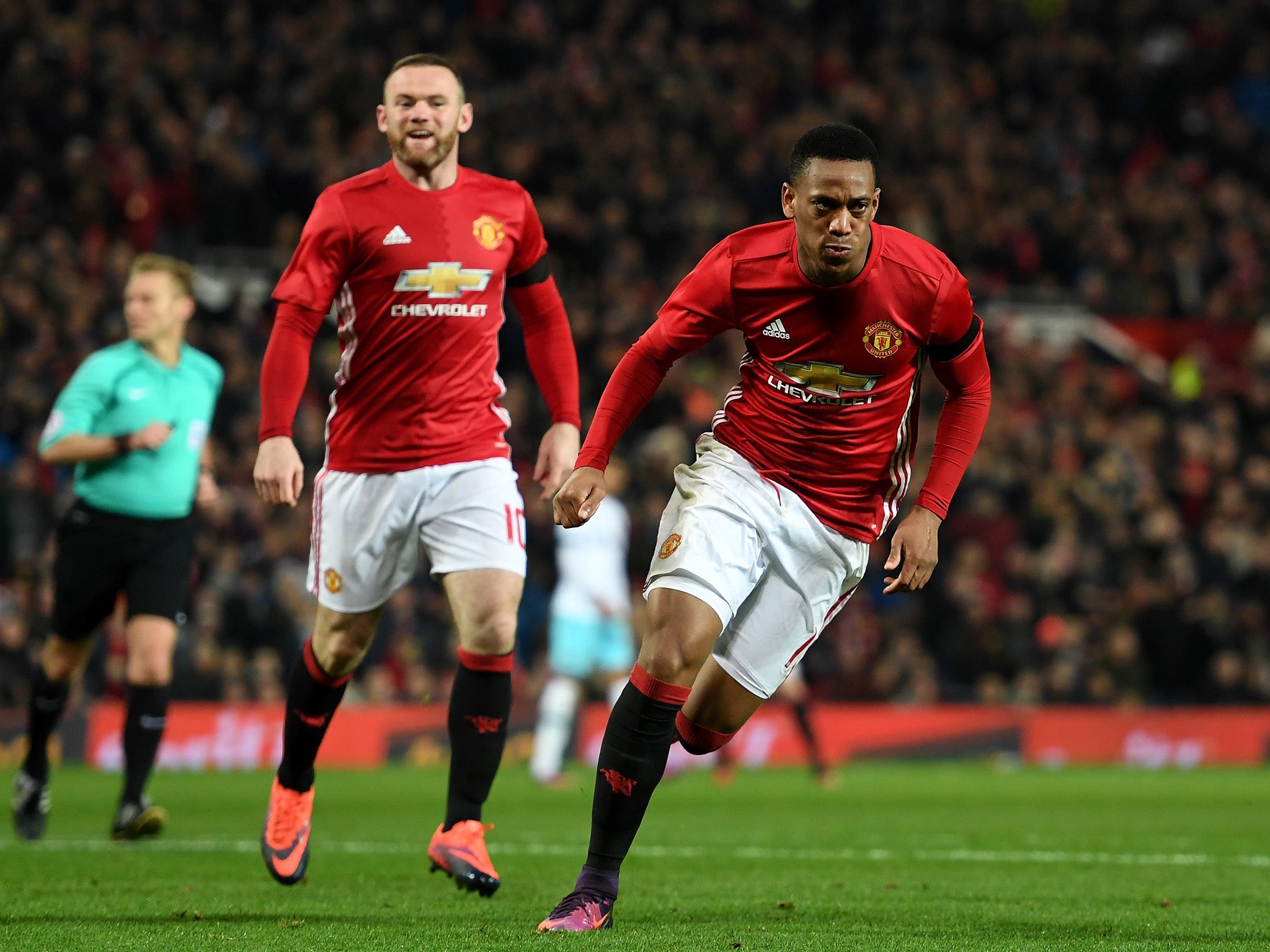 Martial wheels away after restoring United's lead