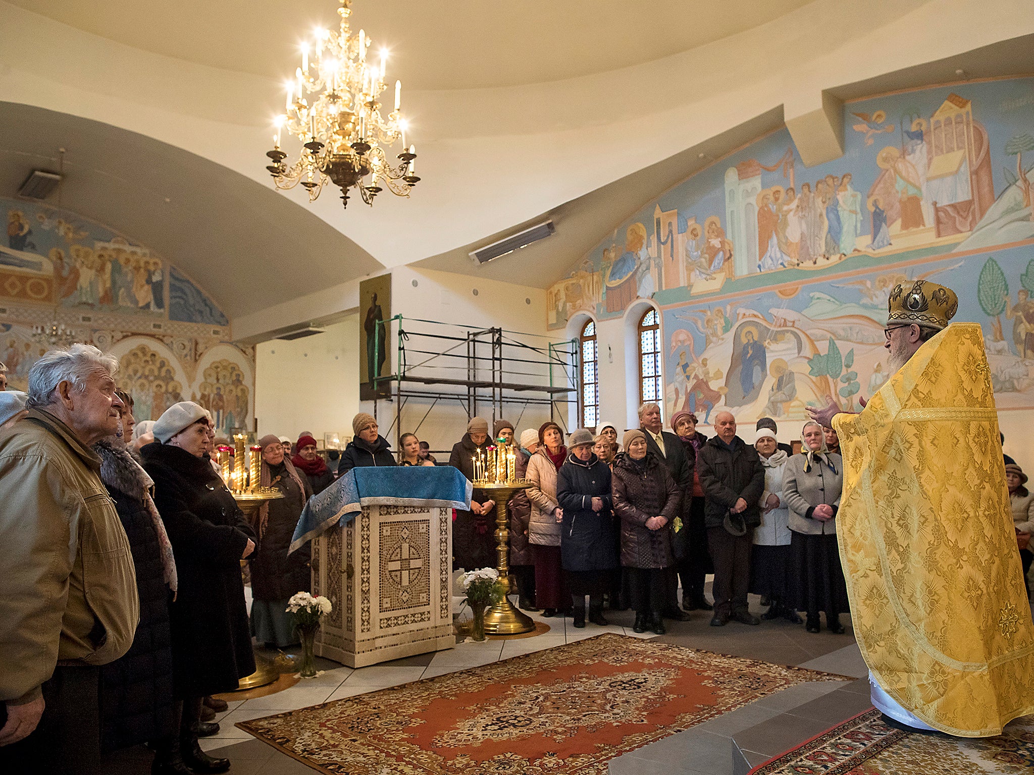 Lithuanian Orthodox priest Josif Zeteisvili speaks during the Sunday mass at the Saint Panteleimon Orthodox Church in Visaginas some 150km (93 miles) northeast of the capital Vilnius, Lithuania