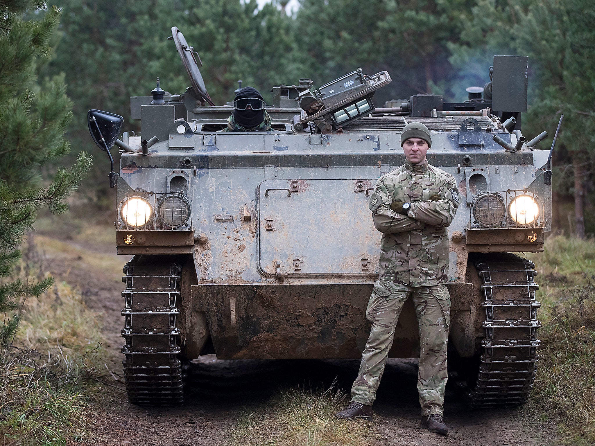 Young Lithuanian civilians in military fatigues practice insurgency tactics that they fear could be needed given Russia's resurgence, in the village of Pomarazai, some 25 km (15 miles) from the capital Vilnius, Lithuania