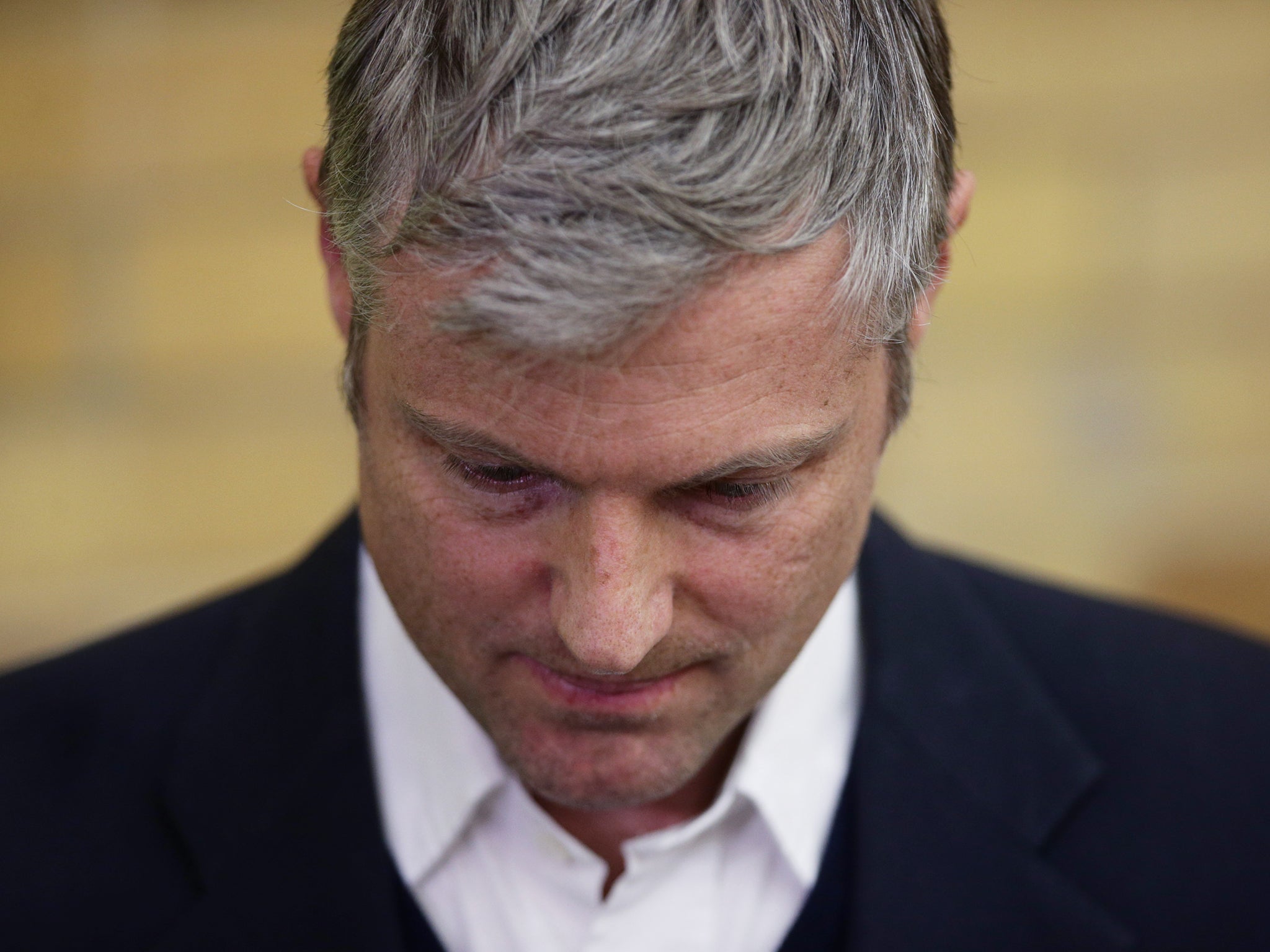 Zac Goldsmith looking dejected whilst listening to newly-elected Liberal Democrat MP Sarah Olney speaking, during the Richmond Park by-election in Richmond upon Thames College (PA wire)