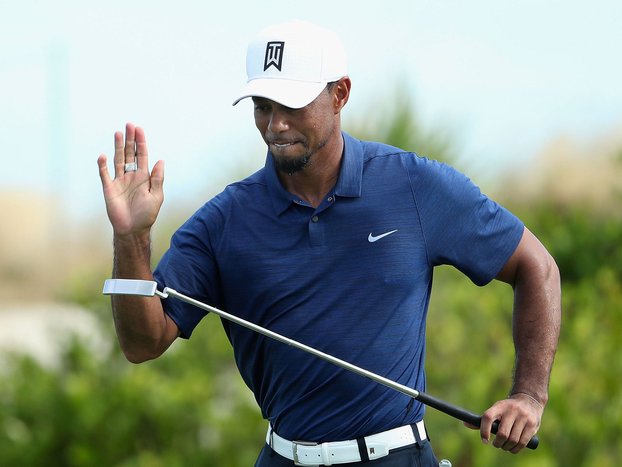 Woods started the day on his own after Justin Rose pulled out