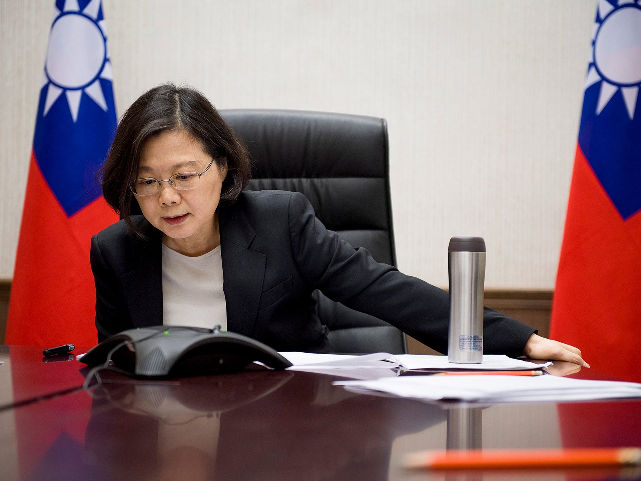 Taiwan's President Tsai Ing-wen speaks on the phone with US President-elect Donald Trump at her office in Taipei, Taiwan