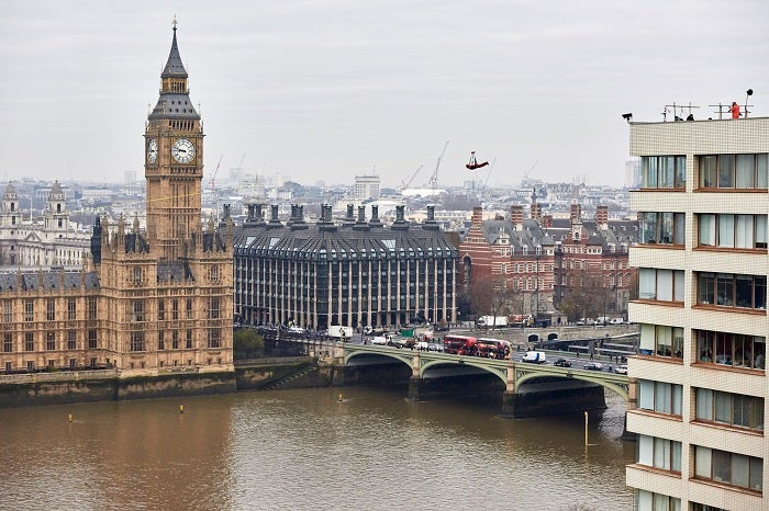 Daredevils were suspended over London's rooftops