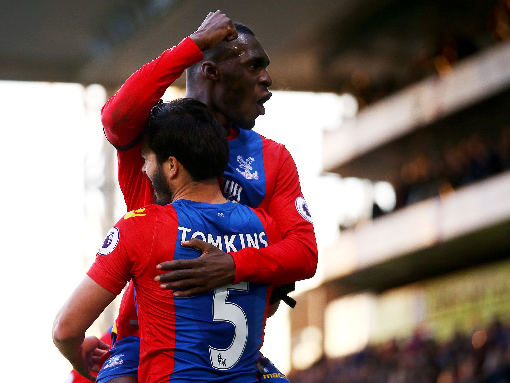 Tomkins celebrates scoring his side's second with Benteke