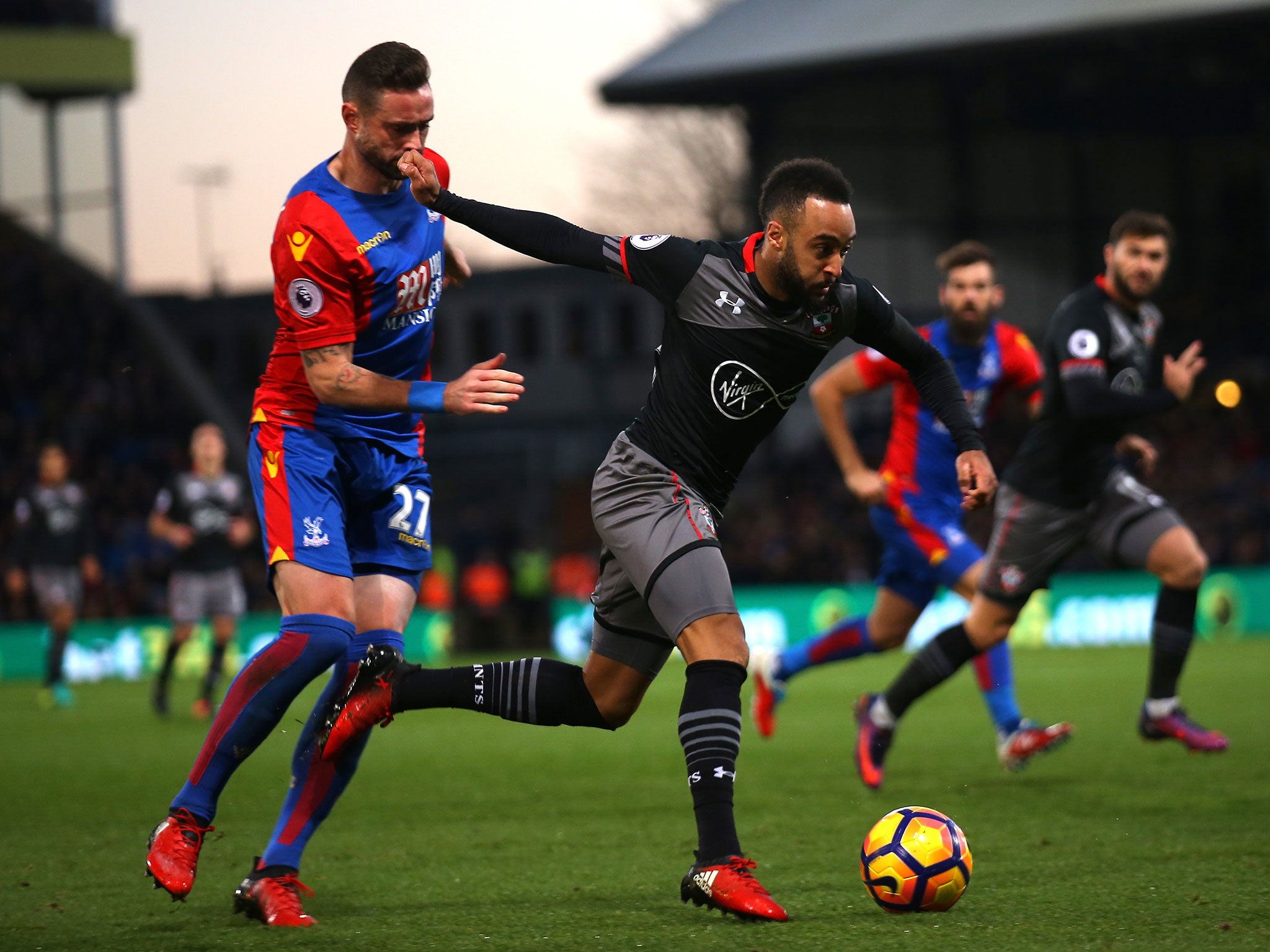 Nathan Redmond rushes to get away from Damien Delaney