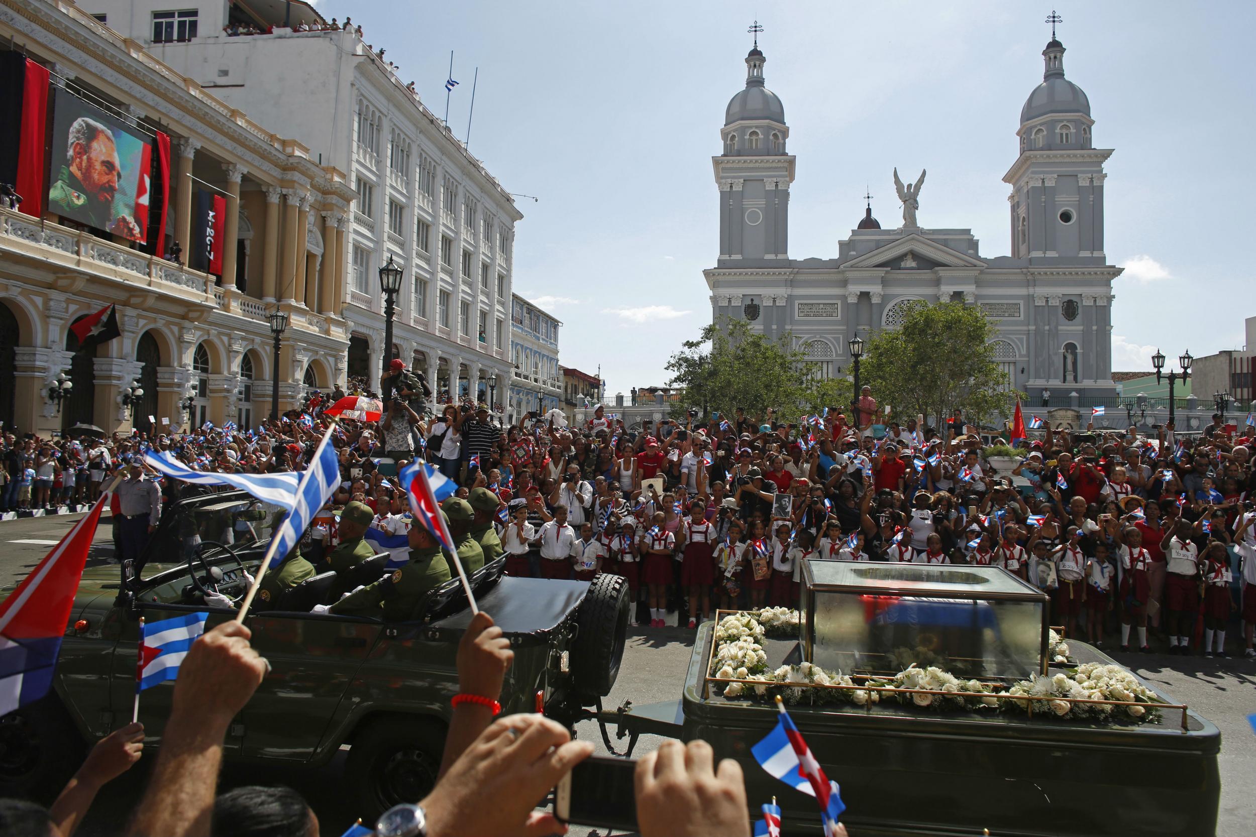 Thousands lined the streets in Santiago as Castro's ashes were taken to be interred