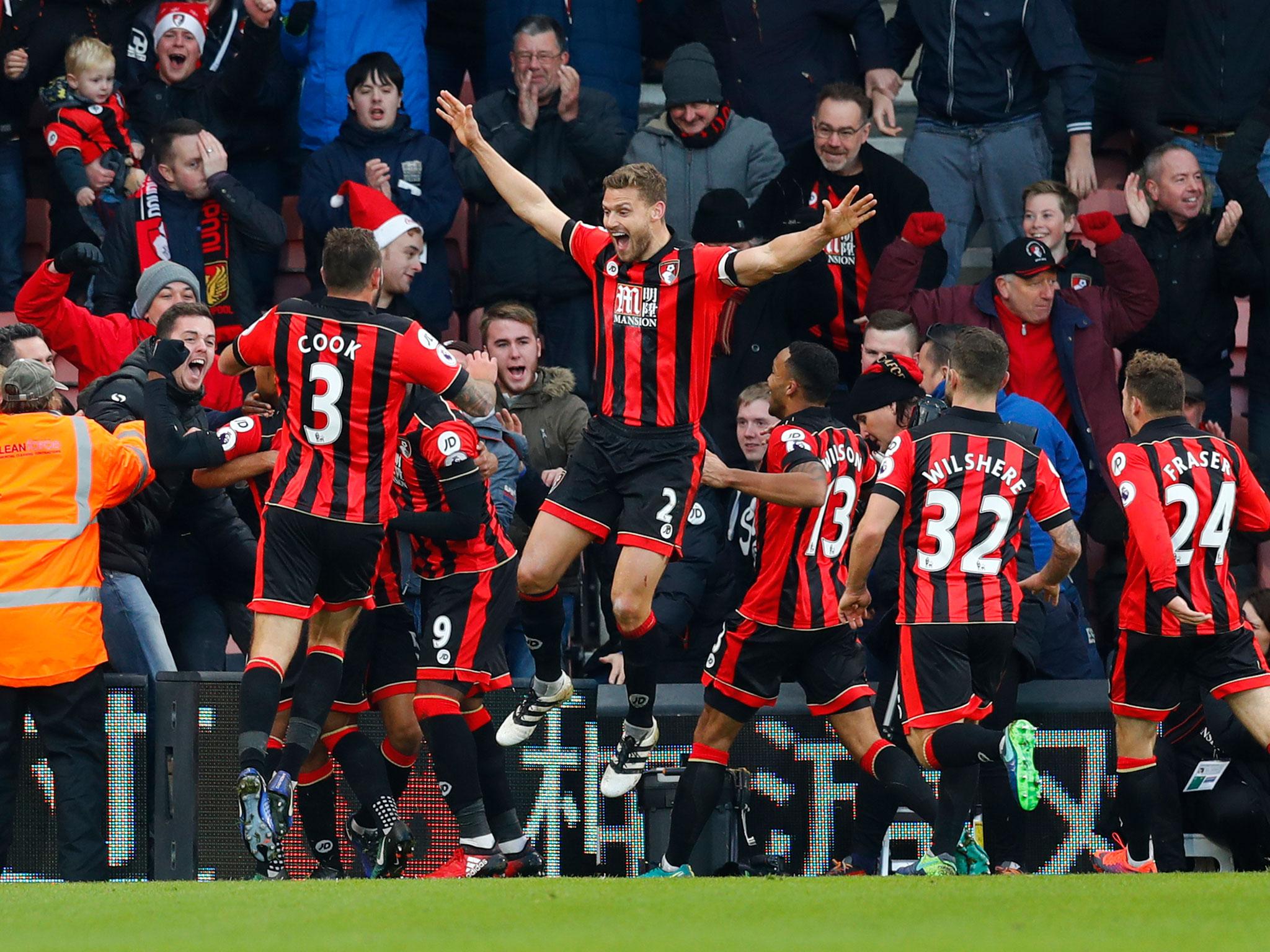 Nathan Ake struck late into extra time to cap off a stunning come-back and hand Bournemouth all three points