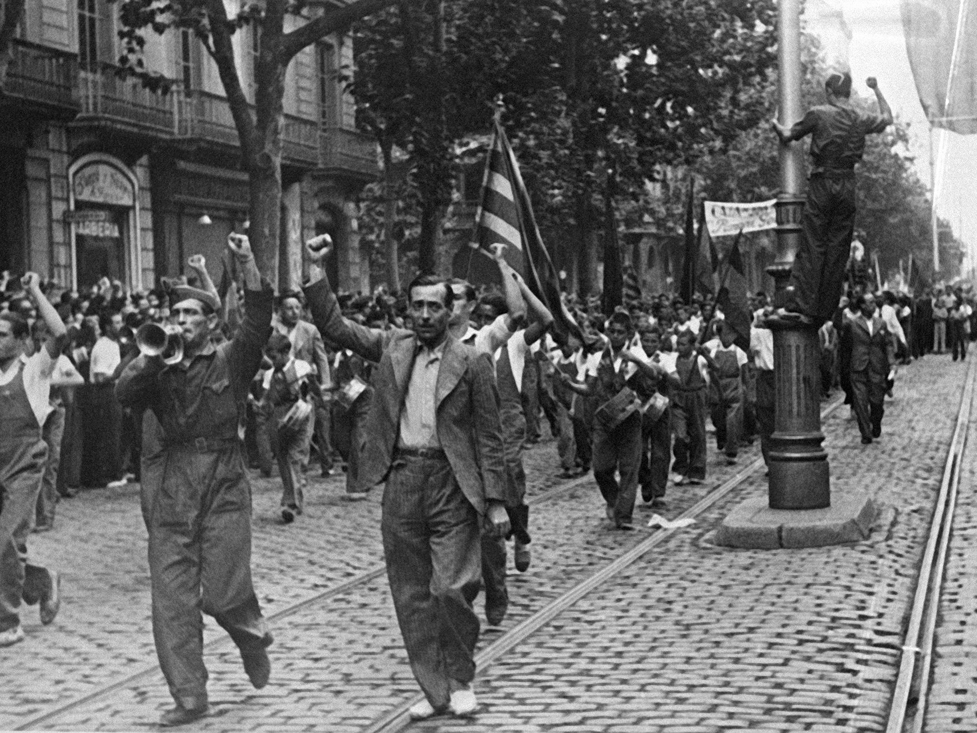 The wounds caused by the Spanish Civil War are still sensitive in the country. This Picture dated July 1936 shows Republicans of leftist parties demonstrating in the streets of Barcelona against Franco's attempt to overthrow the Republic