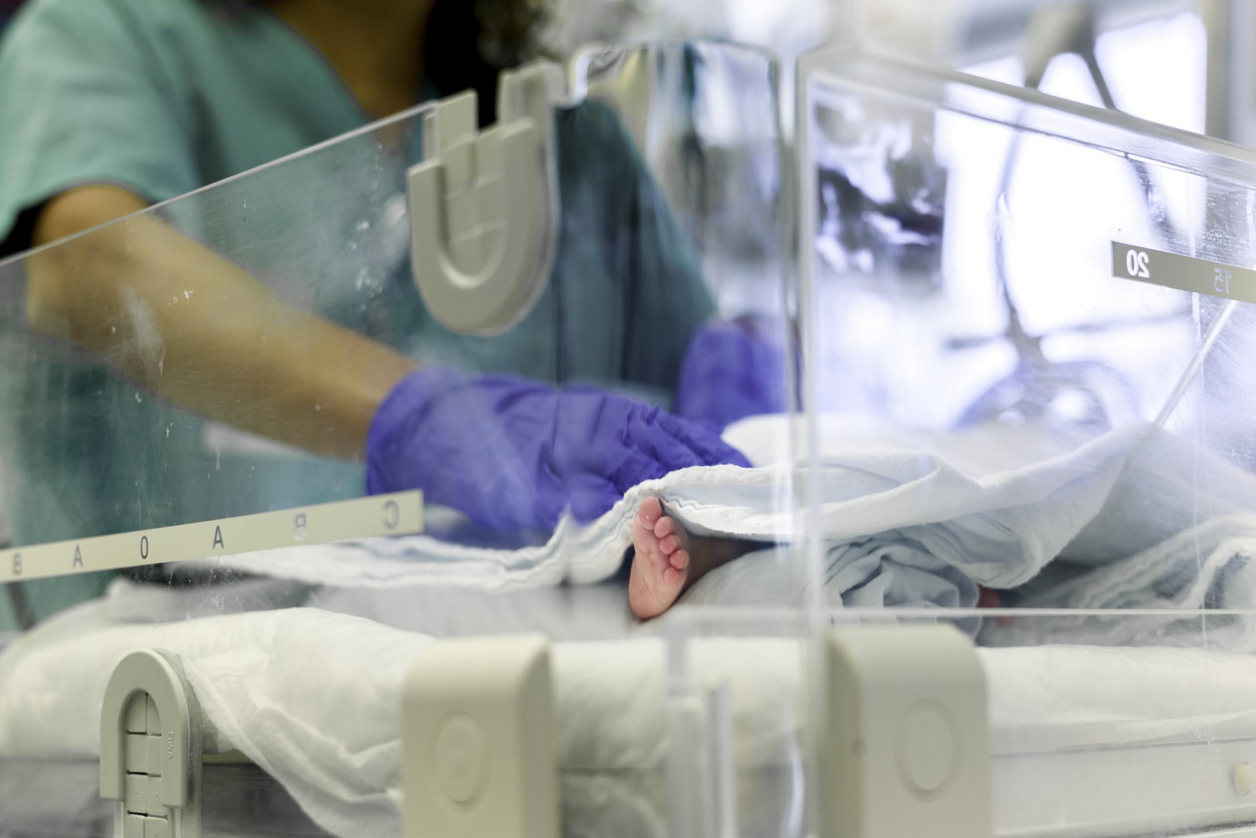 A three month old arab baby boy being treated by an Israeli doctor - Alan Schaller