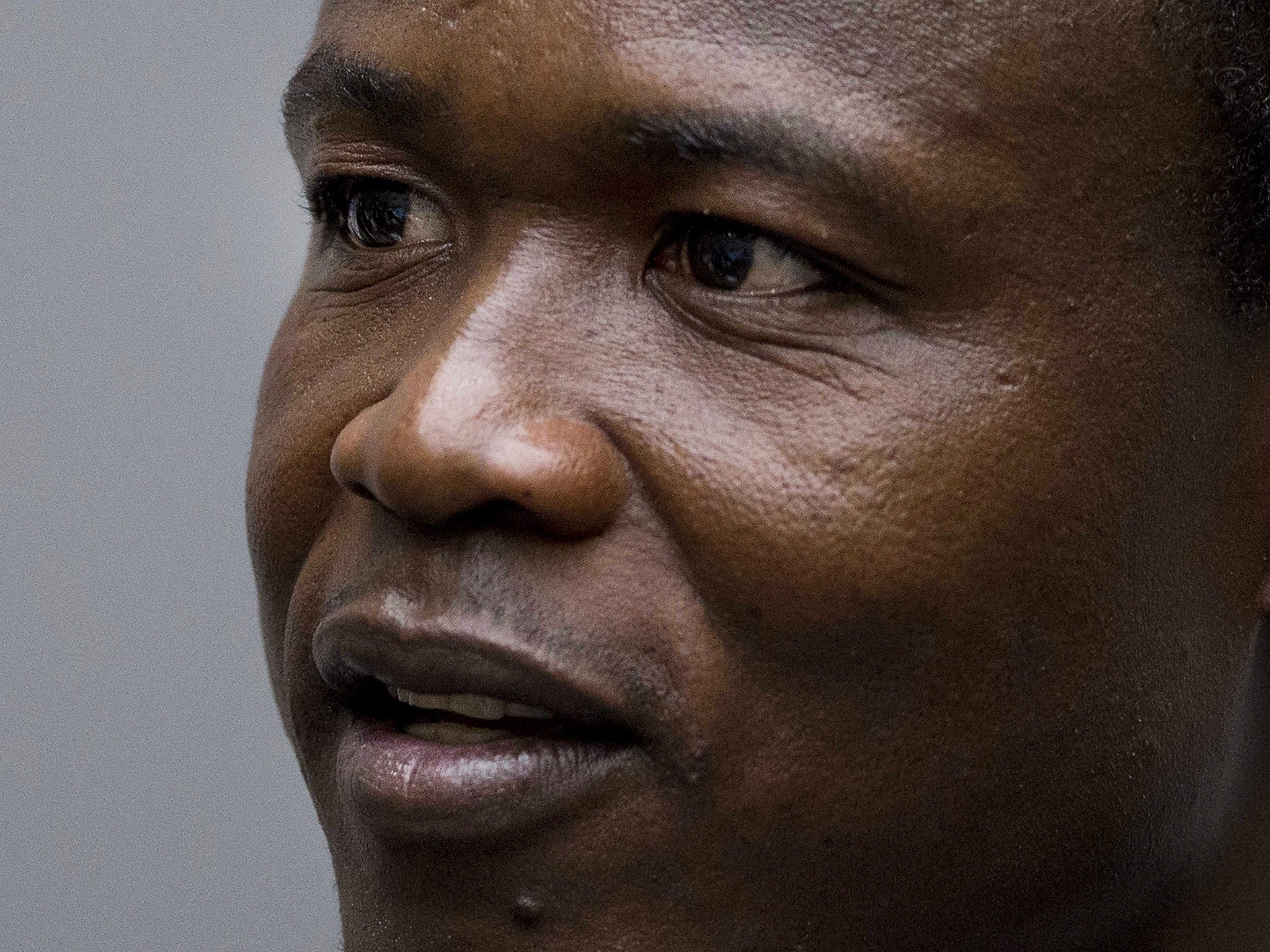 Dominic Ongwen sits in the courtroom of the International Court in The Hague