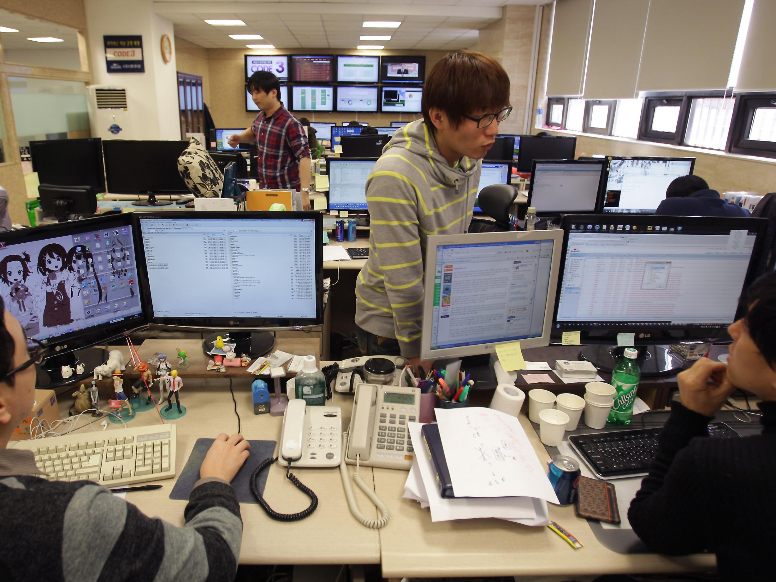 Researchers investigating computer viruses at an IT security company in Seoul, South Korea after a cyber attack