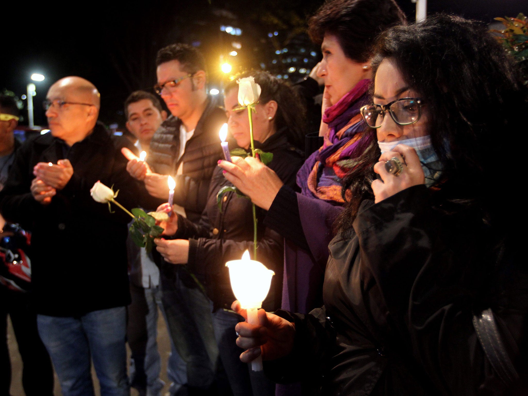 A candlelight vigil for seven-year-old Yuliana Andrea Samboni in Bogota, Colombia, on 7 December