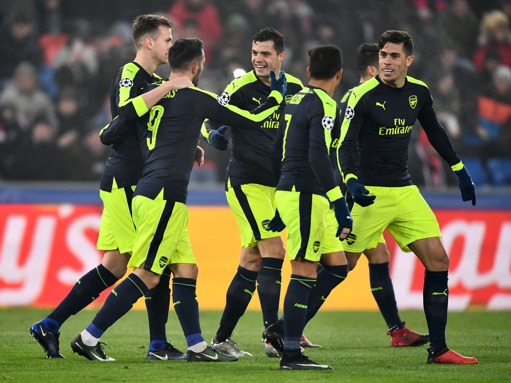 Arsenal beat Basel 4-1 to finish top of their Champions League group for the first time in five seasons