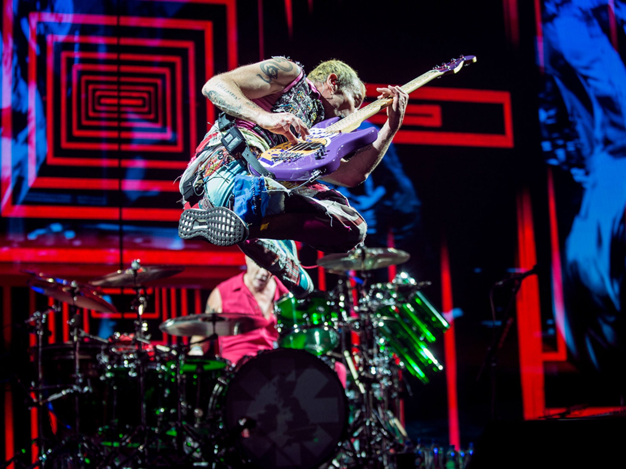 Flea of the Red Hot Chili Peppers also walked across the stage on his hands during the show (Neil Lupin/neillupin.com)