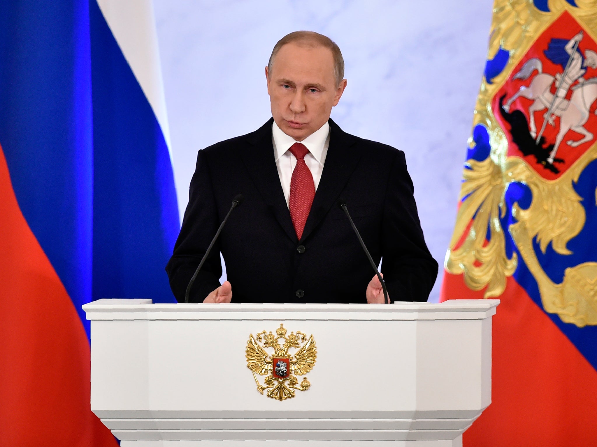 Vladimir Putin addresses the Federal Assembly of both houses of parliament at the Kremlin this month