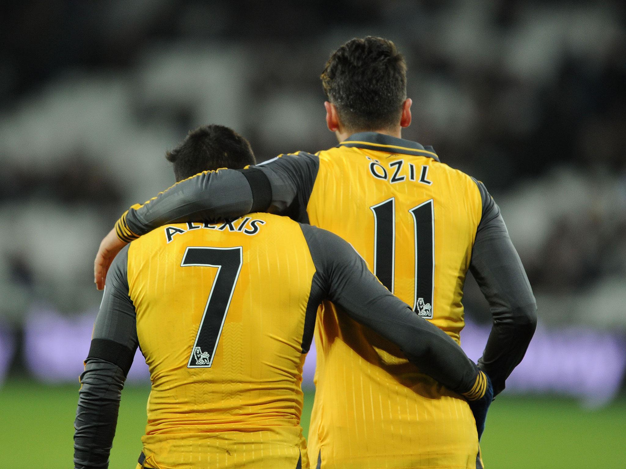 &#13;
Both Sanchez and Ozil are providing Wenger with a headache &#13;