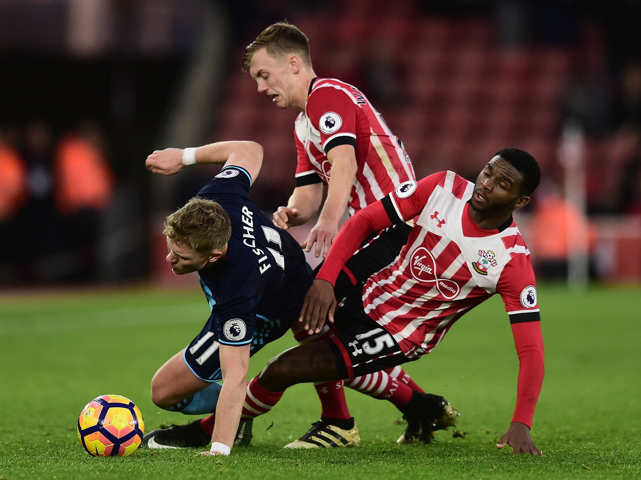 James Ward-Prowse, Cuco Martina and Viktor Fischer all vie for possession