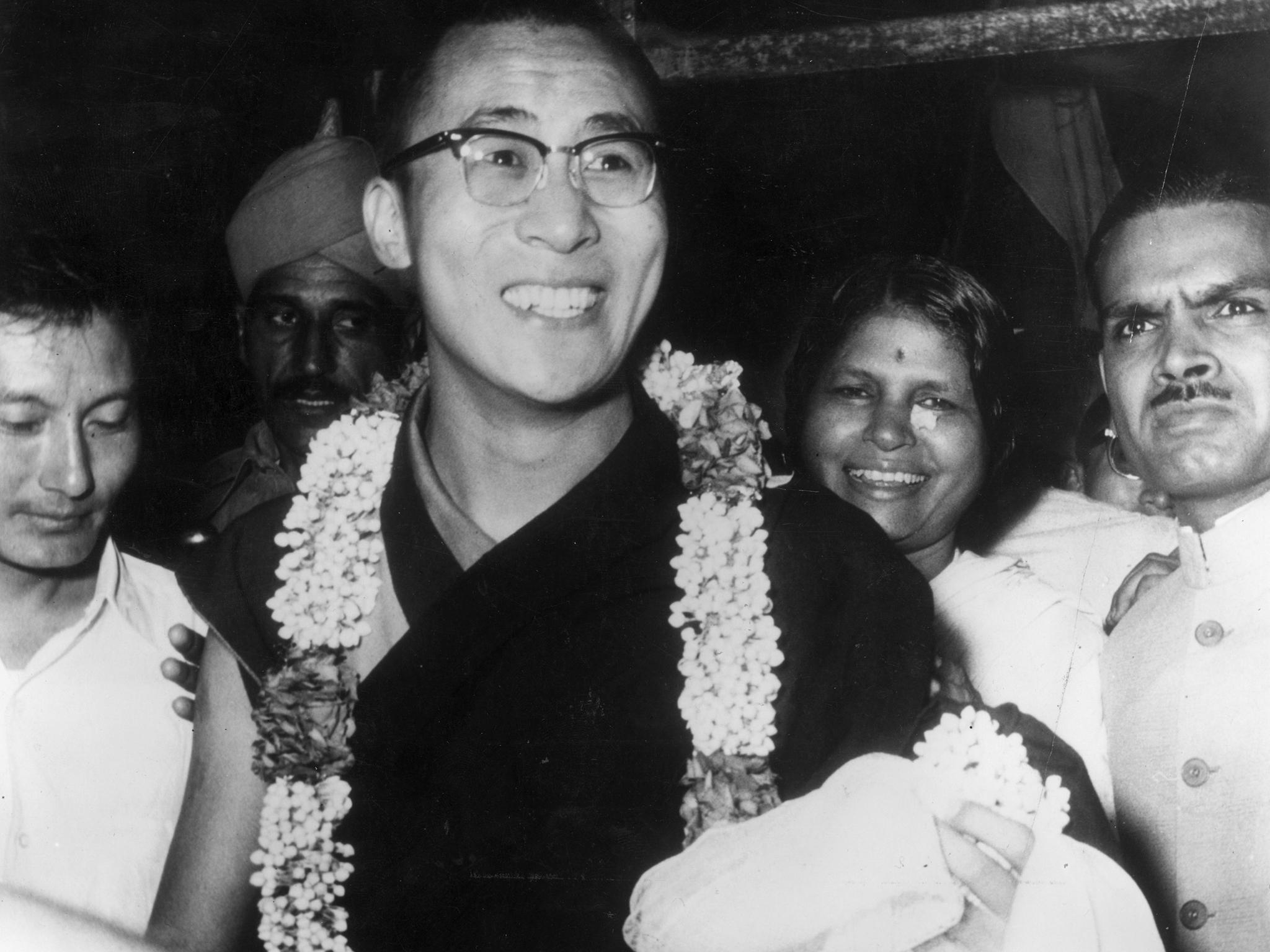The 14th Dalai Lama, Tenzin Gyatso, spiritual and temporal ruler of Tibet, arrives in Delhi, on his first visit to the Indian capital since he sought asylum