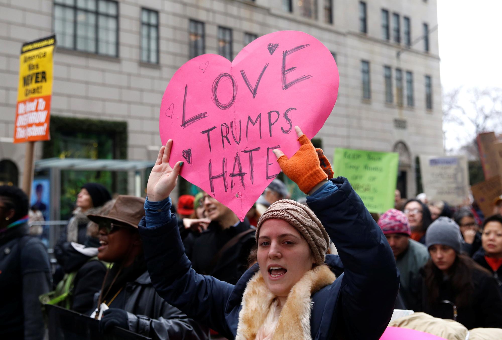 Protestors march during a demonstration against U.S. President-elect Donald Trump near Trump Tower in the Manhattan borough of New York City, December 12, 2016.