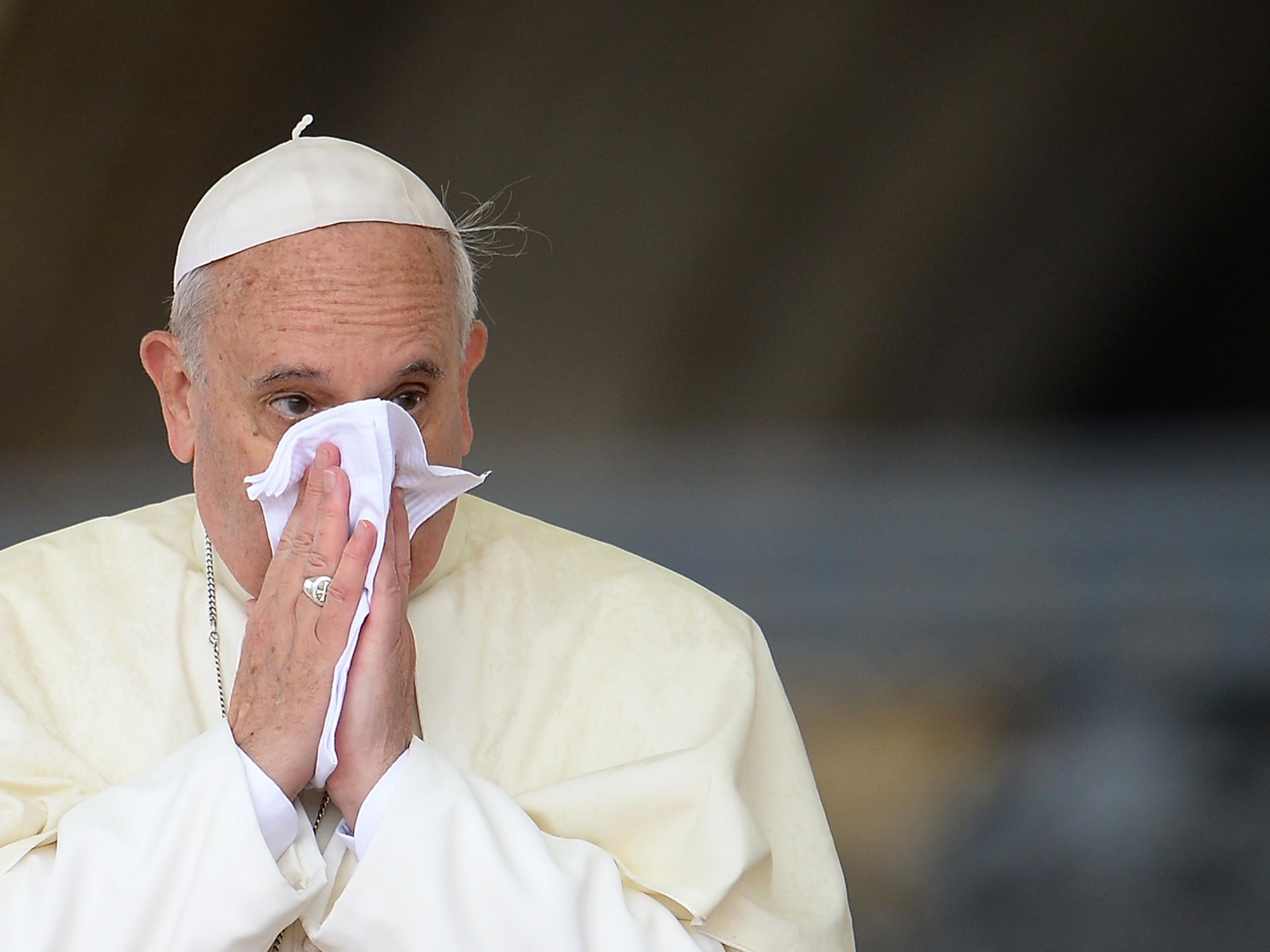 Pope Francis blows his nose during a 2013 ceremony in Rome