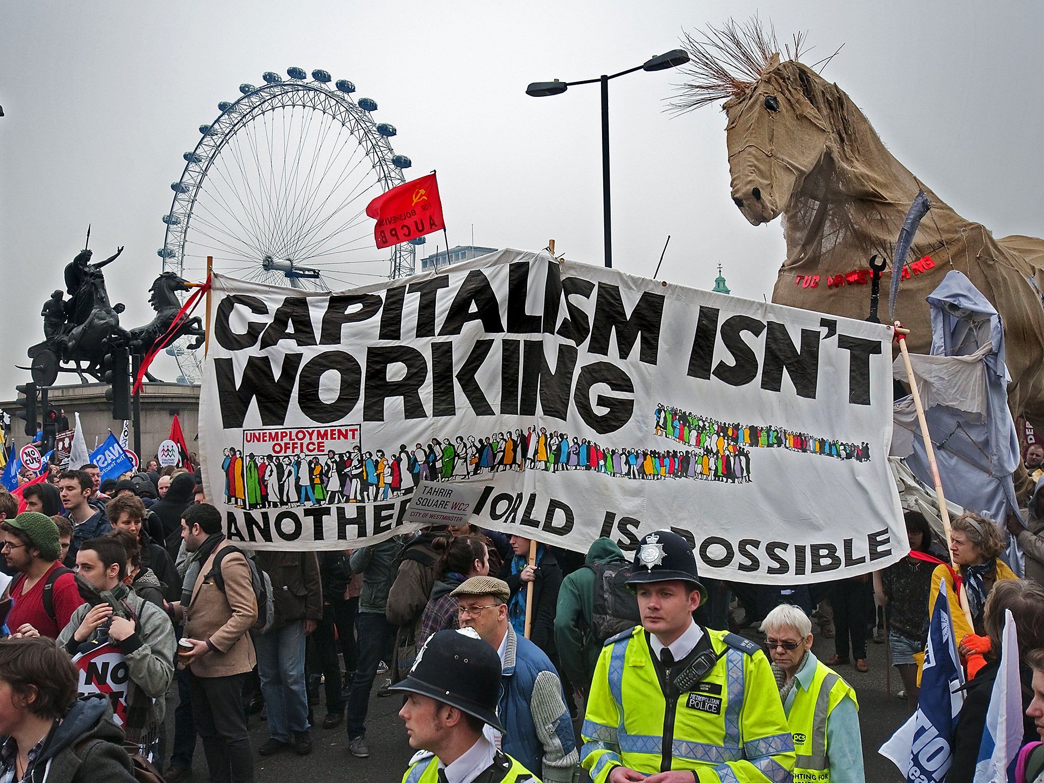 Half a million protesters join an anti-cuts 'March for the Alternative' rally organised by the TUC (Rex)