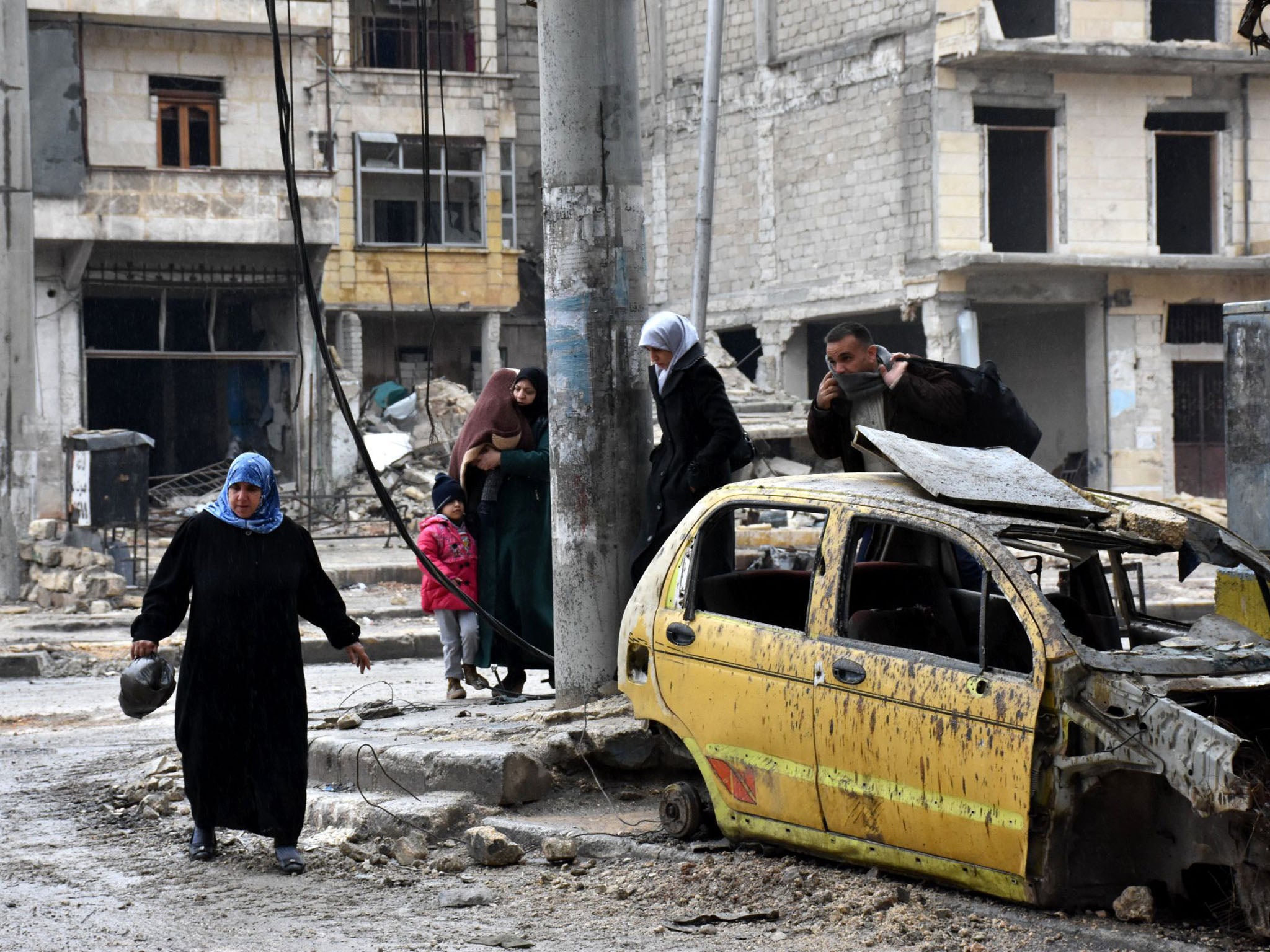 Thousands of civilians have risked being caught in crossfire to flee to regime and Kurdish controlled parts of the city since fighting intensified two weeks ago