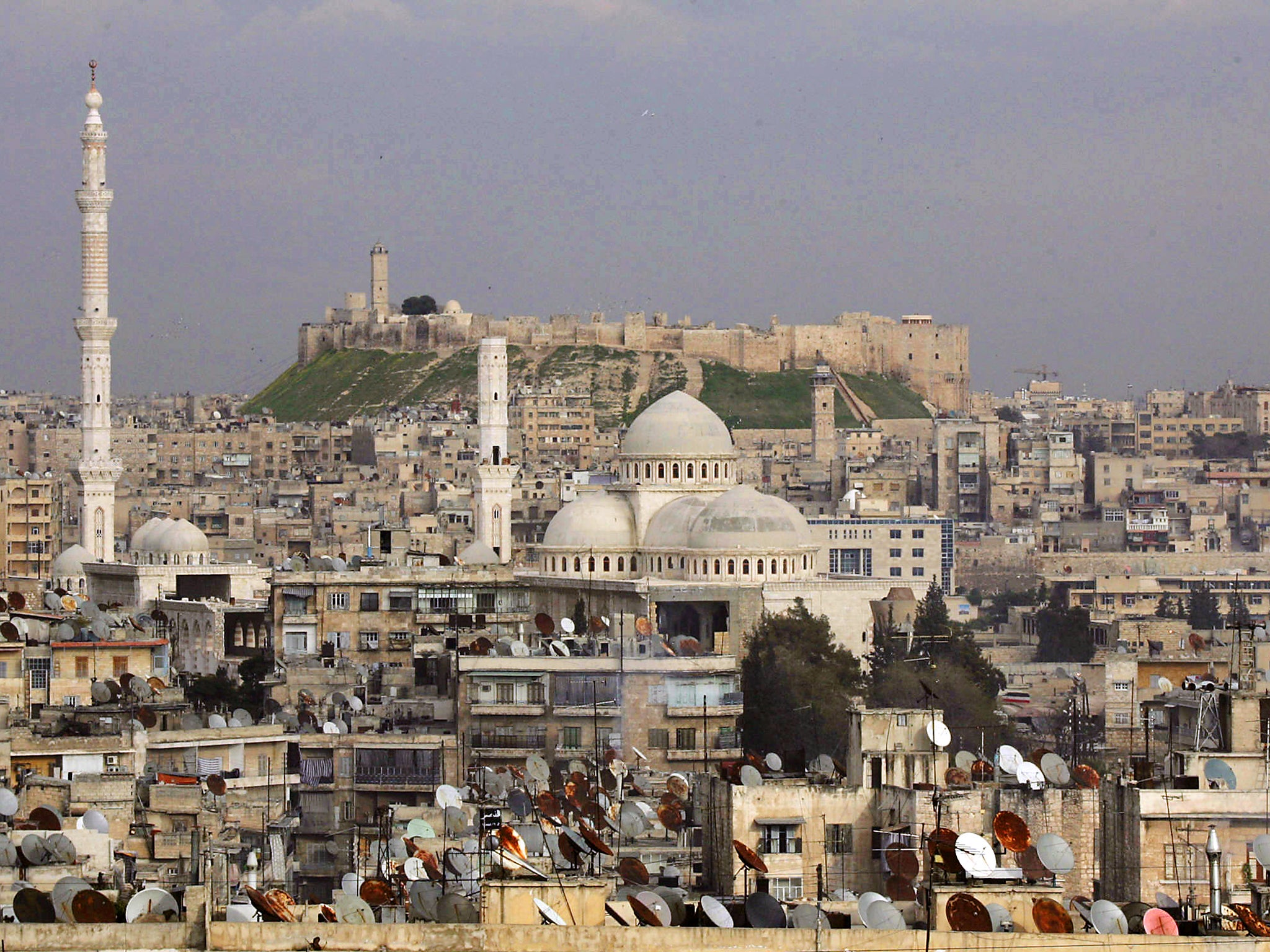 A general view of the historic Syrian city of Aleppo, 350 kms north of Damascus, with its landmark citadel in the background