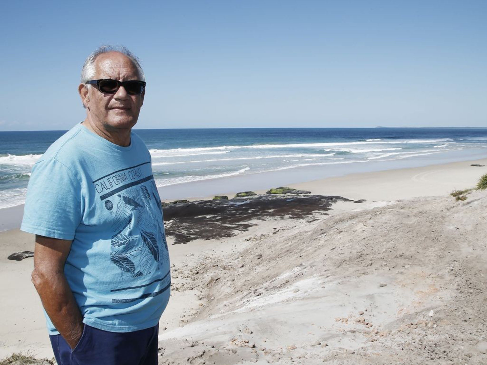 Gordon Davis stands near the spot where his stepdaughter Lynette Daley died in Yamba, Australia