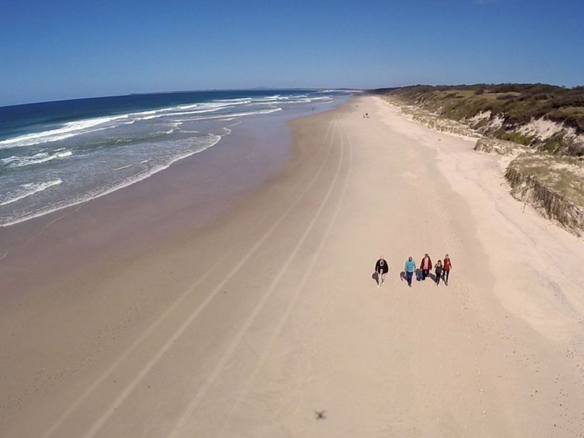 Lynette's family walk along the Ten Mile Beach where she died